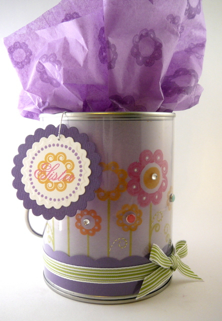 I decorated this Prima acrylic bucket to hold a gift for my sister. The images are stamped on...