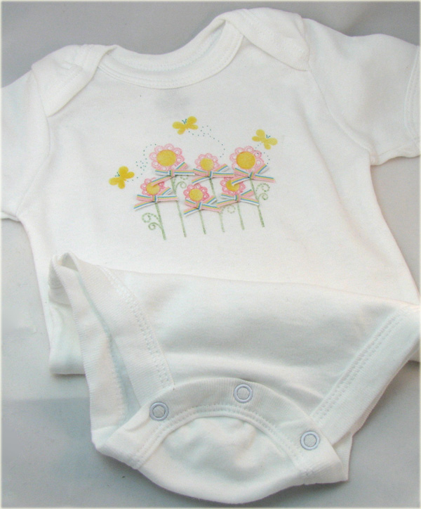 Stamps: Women of Life<br />
<br />
Ink: Palette inks<br />
<br />
Accessories: ribbon from a...
