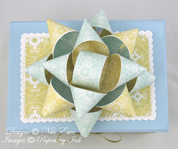 Close up top of the box and of the bow created using Everyday Blessings patterned paper.