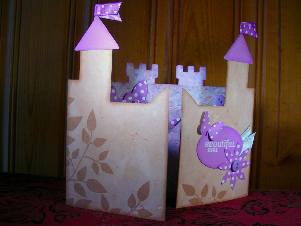 This is a hand cut castle to display pictures of our god daughter.  She is a beautiful...
