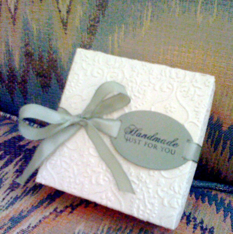 little gift box using heavier packing paper from PTI <br />
Cuttlebugged with textile folder,...