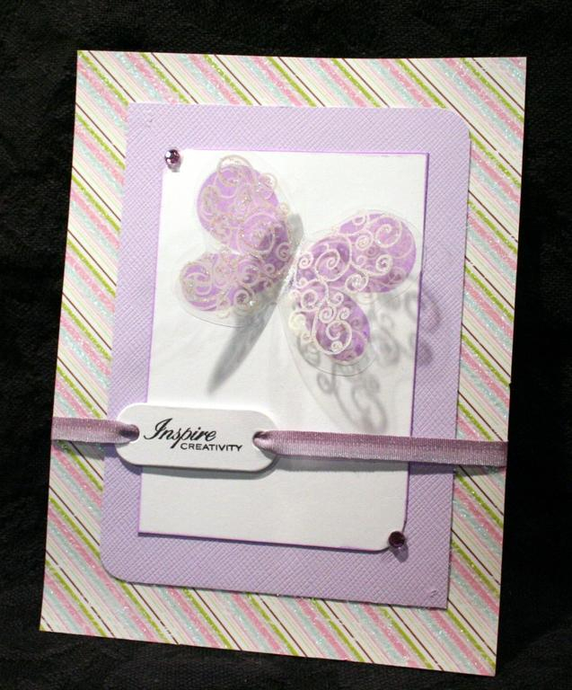 Butterfly Kisses again. The butterfly was stamped onto acrylic. I scored the middle and then...
