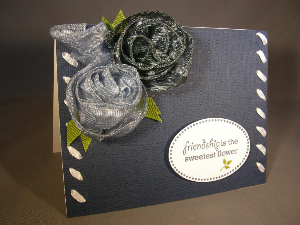 Made for March Blog Hop.  I love the roses made from wired ribbon.  I decided to do something...