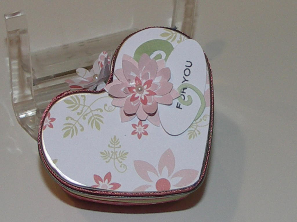 Top of Heart Tin; Sweet Blush Patterned paper; cut out flower with pearl center.