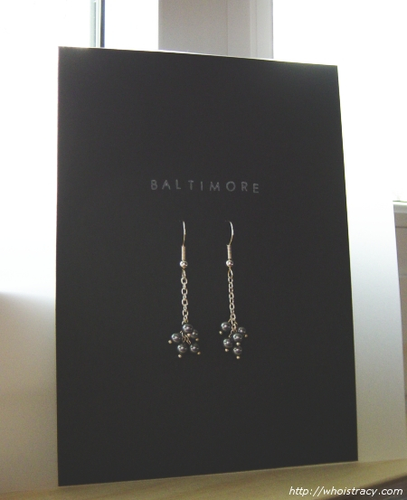 The insert card with the earrings on them. The base is vellum with a piece of black cardstock on...