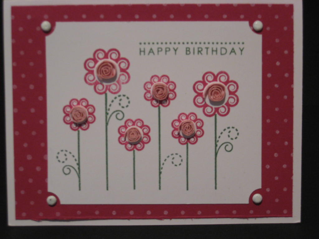 I tried a little quilling on this card.  The flowers remind me of that technique.