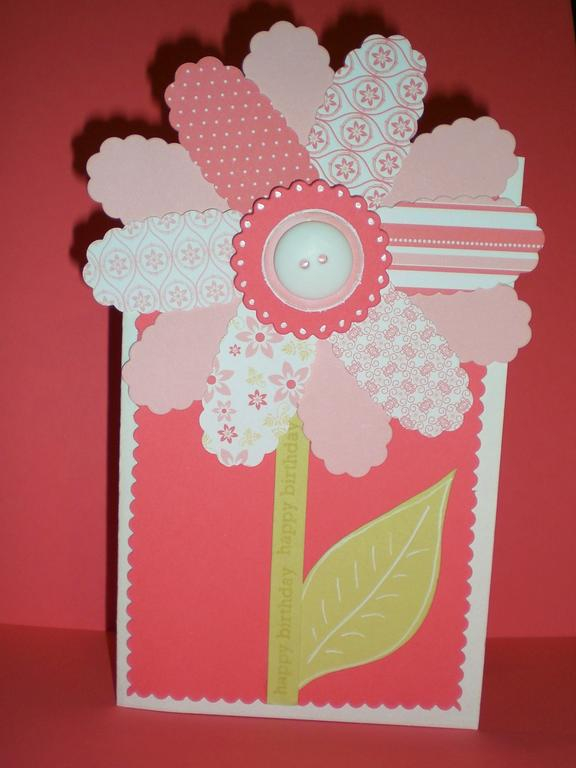 I used the cuttlebug to die cut the petals, I stamped birthday basics down the stem