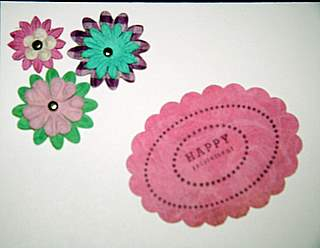 Sorry for the fuzzy picture.  I used the Border and Corner ovals and mixed message stamps.