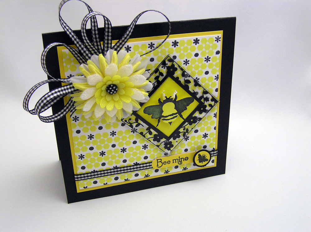 â€¢ Honey Bees â€“ Bee Mine<br />
Stamps:  Honey Bees<br />
Ink:  Paris Lights &amp; Noir...