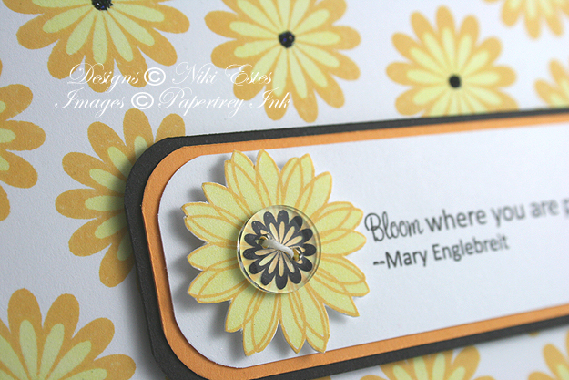 Close up of the button made from poly shrink and flower stamp from Garden of Life.  Recipe under...