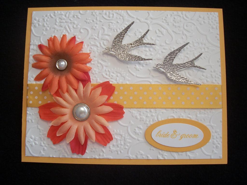 used PTI and embossed the bird from Carte Postal from SU. The flowers I think were from Joann.