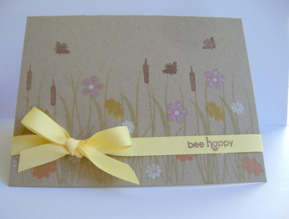 Just something I was playing around with.  Kraft paper, lemon tart ribbon, stamps from HoneyBee,...