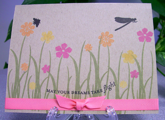 This card was inspired by one that Derbylea made.  I used the PTI kraft paper, stamps from Honey...