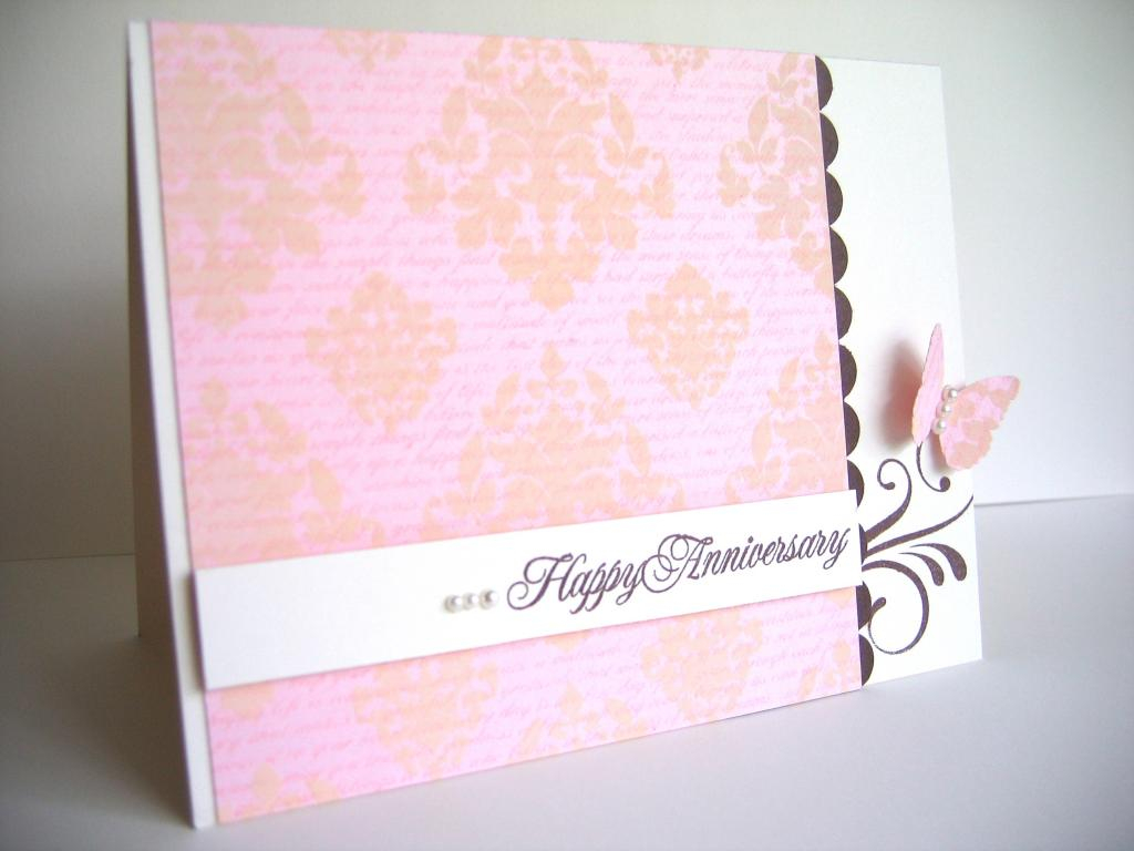 To creat the patterned paper I used versamark to stamp the text and Vintage Cream for the...