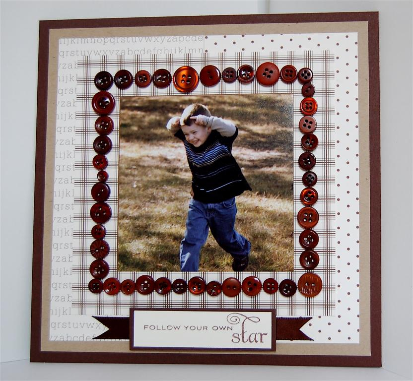 An 8 x 8 scrapbook page, using dark chocolate buttons to frame this sweet picture of my son....