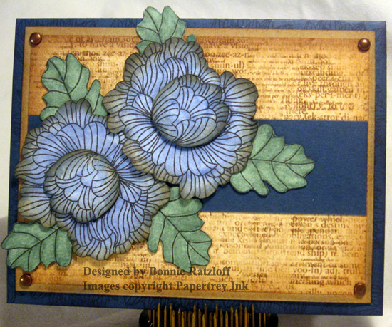 This was my entry for the July Blog Hop.  Flowers, leaves &amp; flower centers are stamped in...