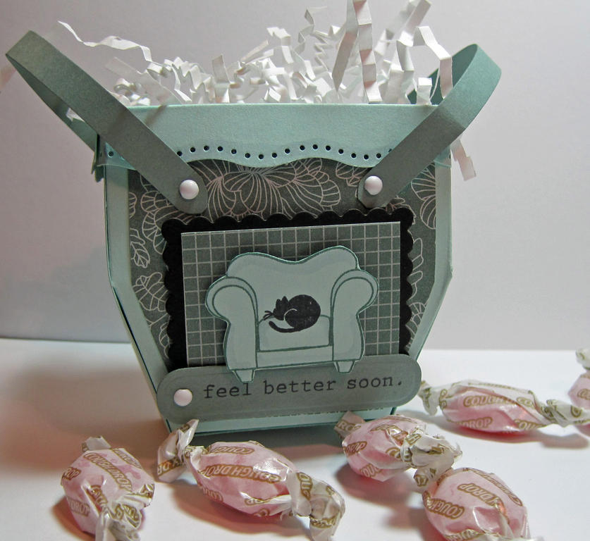 I used Aqua Mist and Ocean Tide papers for my project.  The edge was punched with an EK Success...