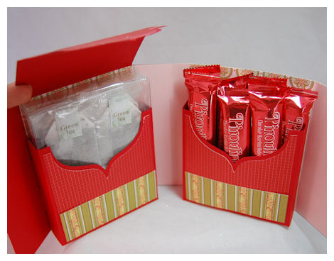 This gift set packaged some tea and pirouline cookies.<br />
<br />
Details and more photos...