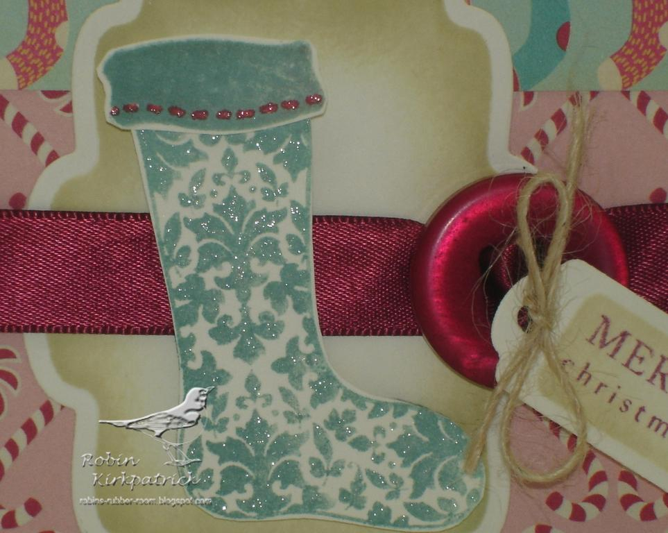 This closeup shows the sparkle from the Spica pens and the popped up stocking - the top of the...