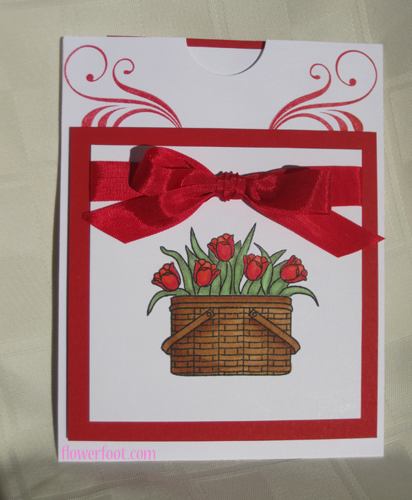 This is a pocket/slider card with a pop-up center. When you pull up the back, another image pops...