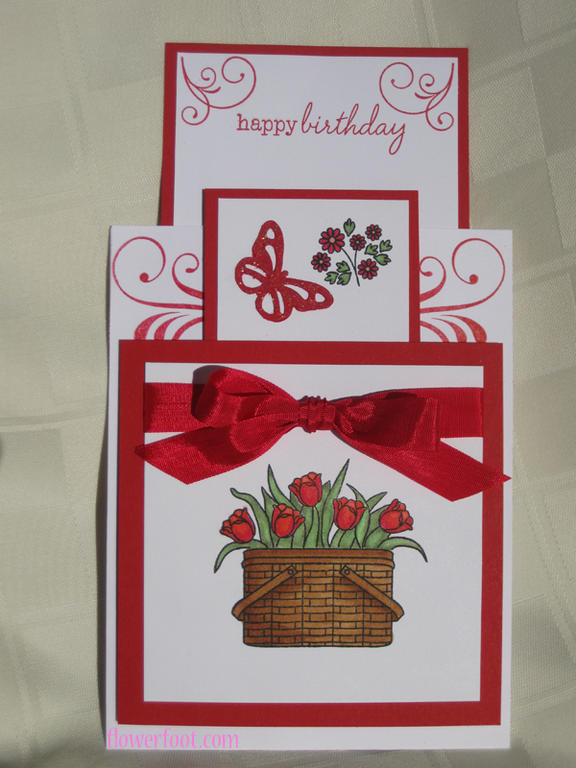 This is a pocket/slider card with a pop-up center. When you pull up the back, another image pops...