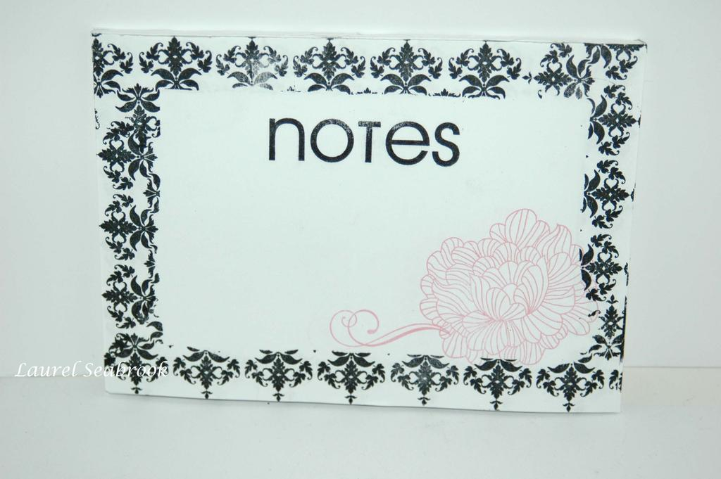 A custom created notepad - each page is stamped.  I used 2 sided sticky tape to bind the papers...