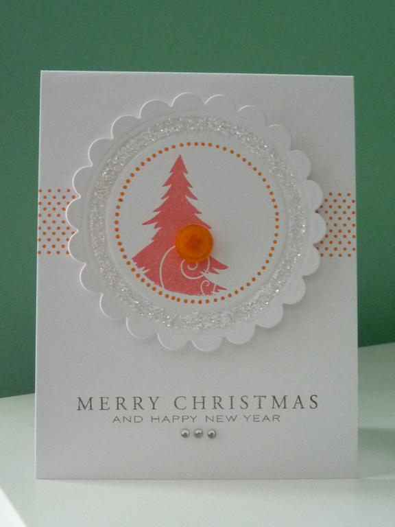 This embossed medallion was made with circle nestablities and then die cut with a scallop circle...