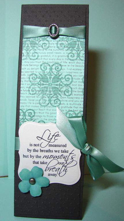 An altered notepad that I made.  The patterned paper was made using Aqua Mist cardstock,...