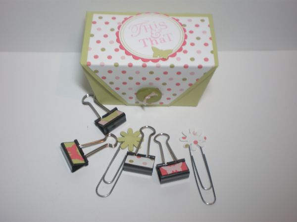 Inside the Tucked Away mini, I decorated mini binder clips and jumbo paper clips and filled it...