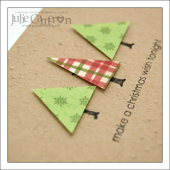 Very quick and easy. After embossing the top and bottom borders. I stamped the tree bases from...