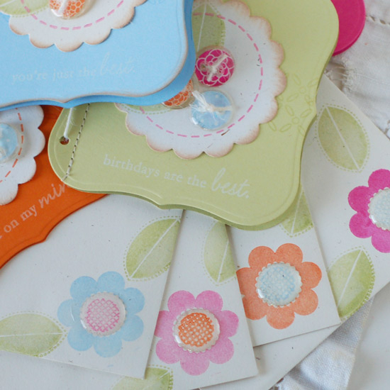 Stamps:  Blooming Button Bits, Borders and Corners Circle, Background Basics: Retro<br />
Ink:...