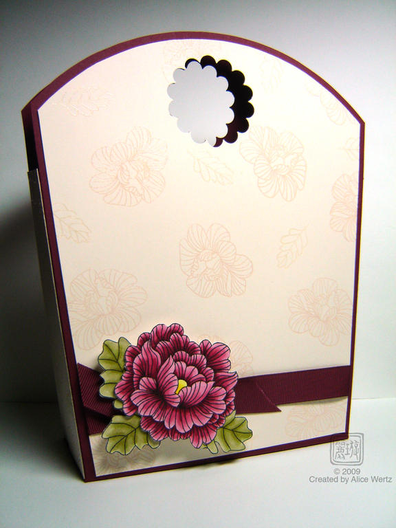I made this as a container for some irregular shaped cards that I made for a friend as a...
