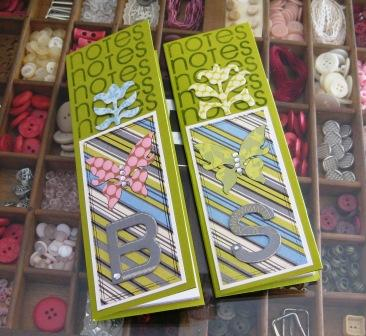 Mixing Amy Butler paper and embellishments with Take Note images to create some little notebooks...