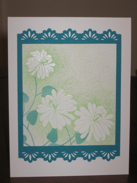 Flowers and leaves are from Floral Fusion.  Fiskars border punch.