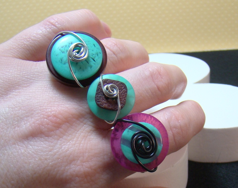 Rings made using Hawaiian Shores, Raspberry Fizz &amp; Chocolate Brown buttons with silver wire.
