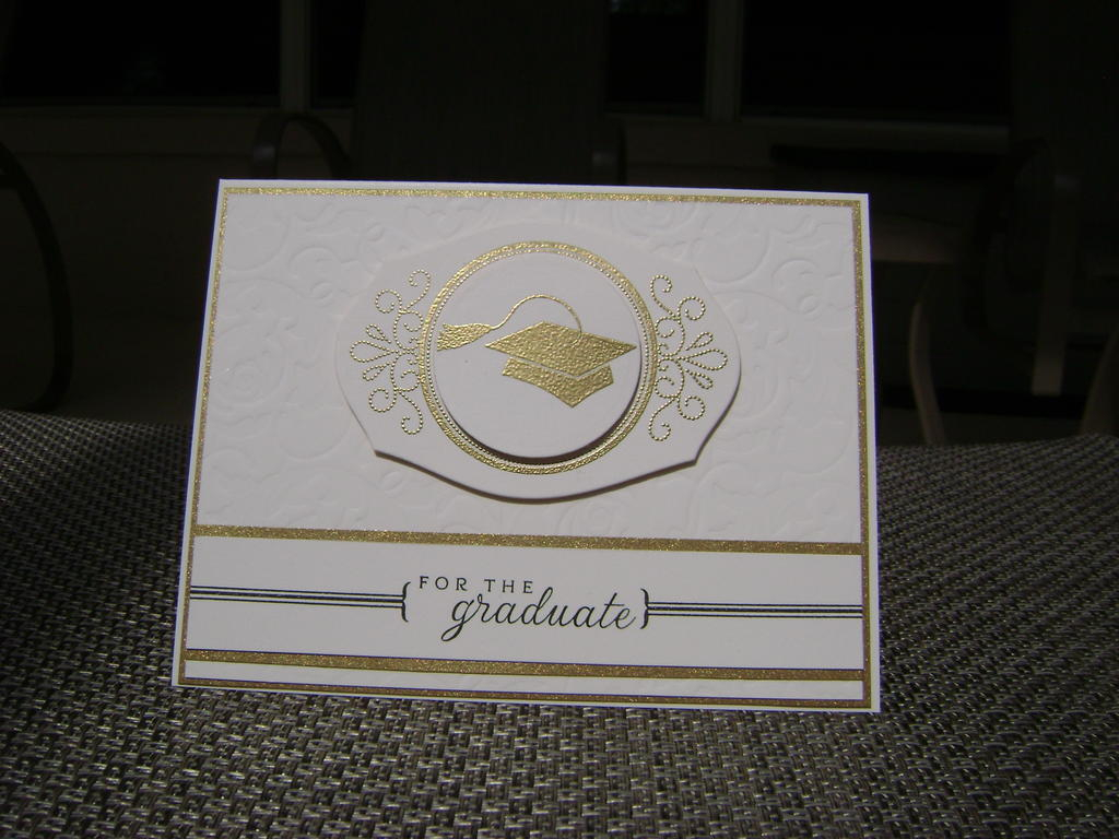 Embossed Vintage Ivory cardstock with Impressablities plate.  Embossed the swirl image from 2010...