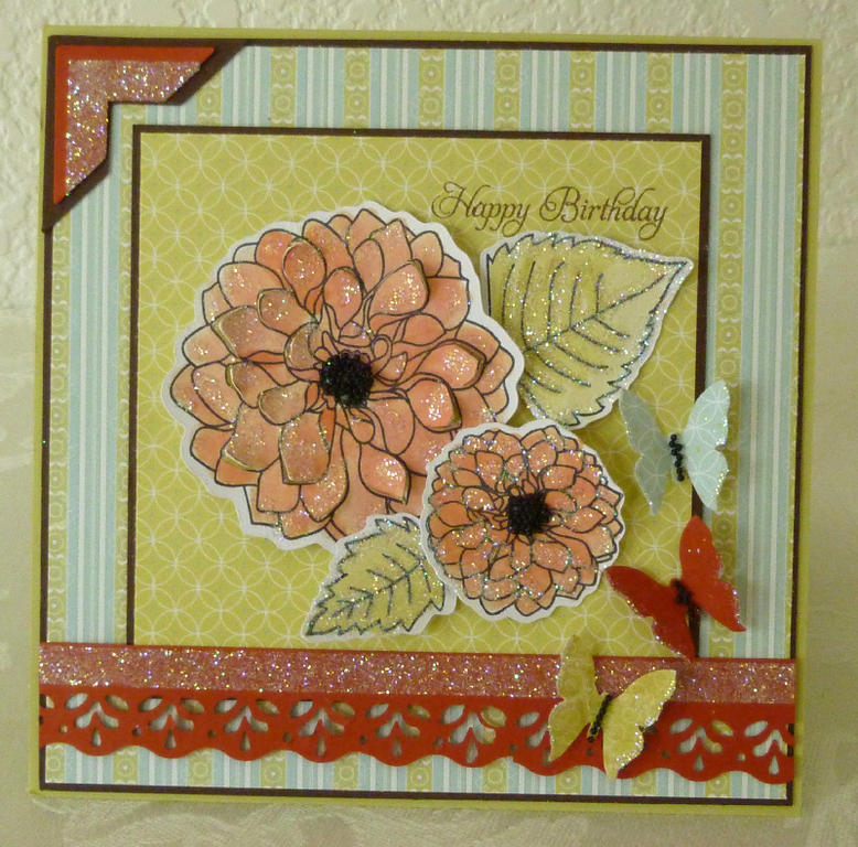 Birthday card using lots of glitter. Made for a color and sketch challenge.