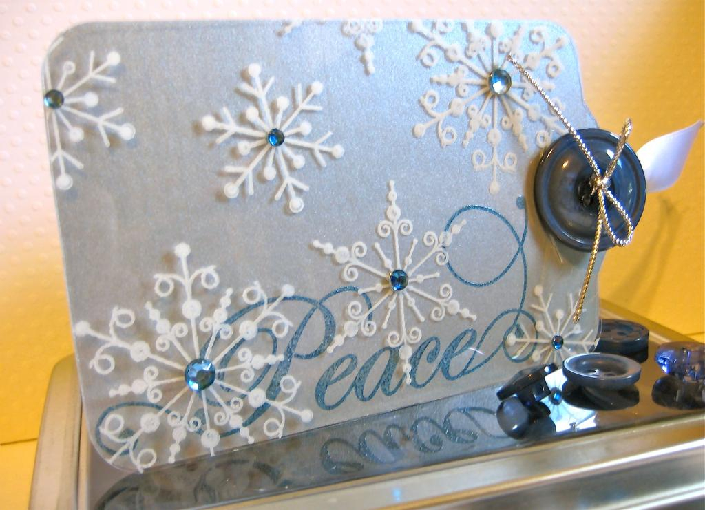 Christmas Tag using Snowflake Serenade. I stamped the snowflakes on clear cardstock and the...