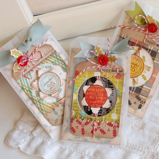 These gift card holders are made from small glassine bags.  There is a window cut in the front...