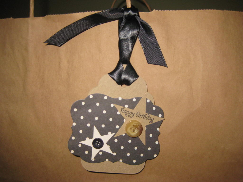 black, cream, kraft tag.  JUGS #55