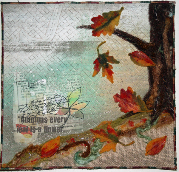 This is a small, mixed media wall hanging, about 12x12. I layered Anna's papers and word...