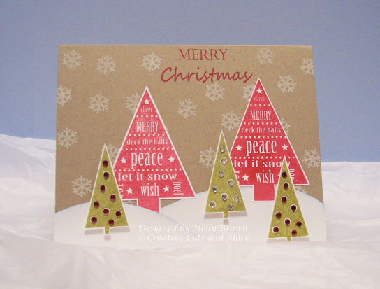 I used a die cut A2 card and created a Christmas tree scene.  I wanted a rustic country feel...