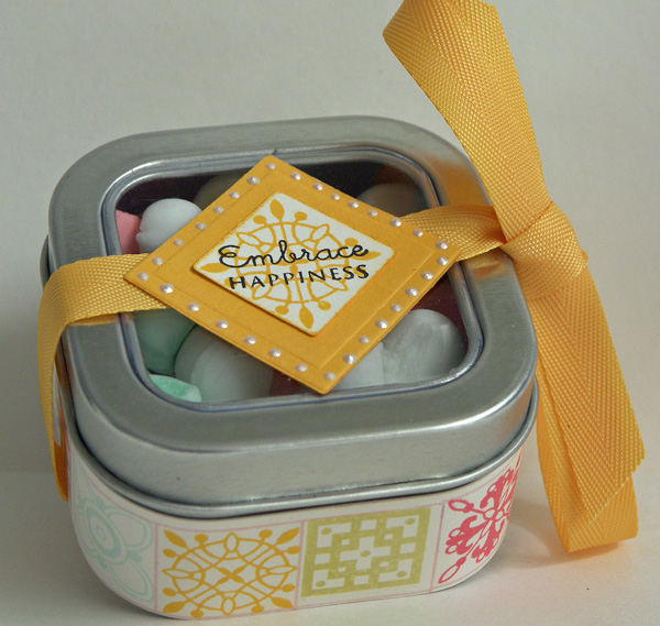 Project Title:  Embrace Happiness Tin<br />
Stamps: Guide Lines, Mixed Messages<br />
Inks:...