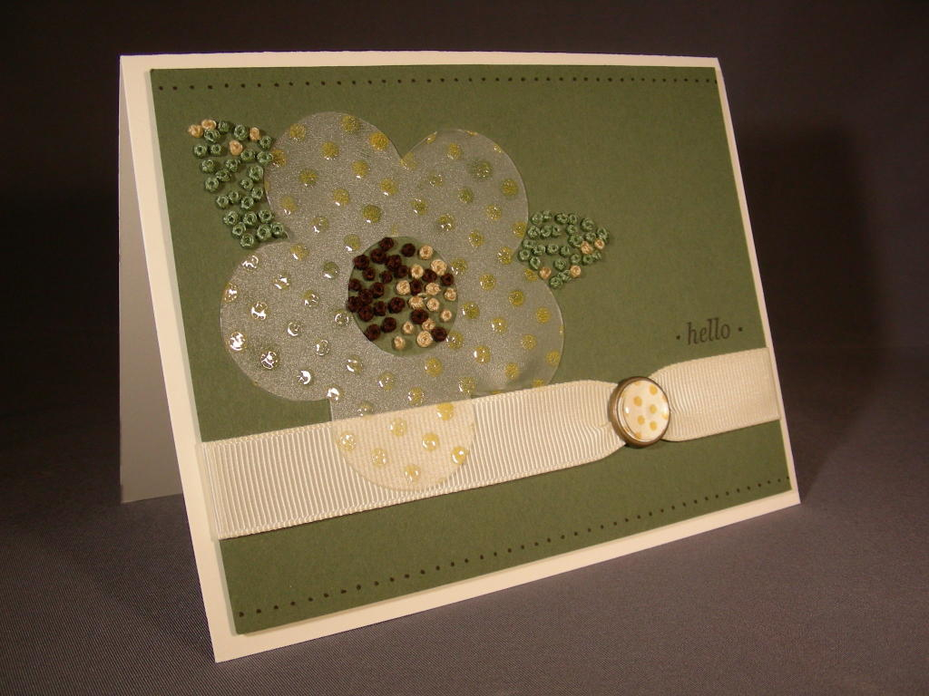 This was a fun card to make.  I stamped and then heat embossed polka dots onto one of my clear...