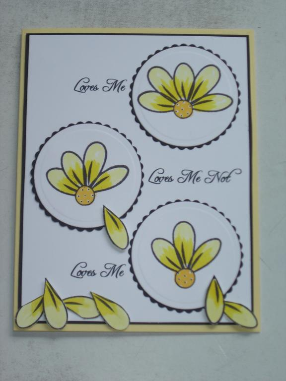 Loves Me<br />
<br />
I created this card using the Flower Garden set along with some masking...
