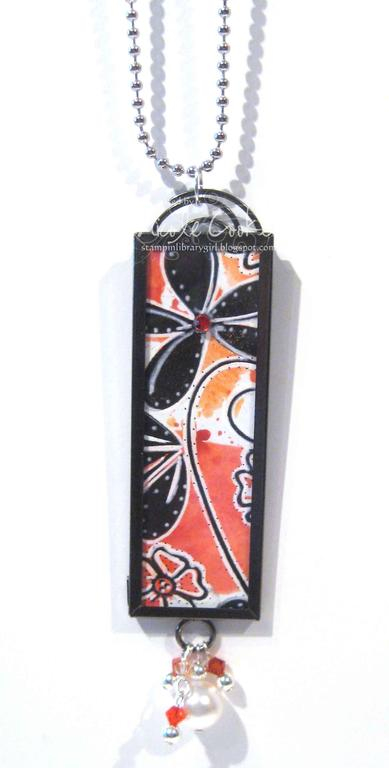 Made with a Ranger Memory Glass frame.  The inside panel was created using Robin Beam&#039;s...