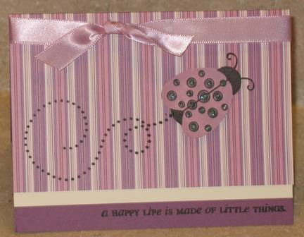 The little ladybug is popped up so that there is more dimension to the card.<br />
Materials...