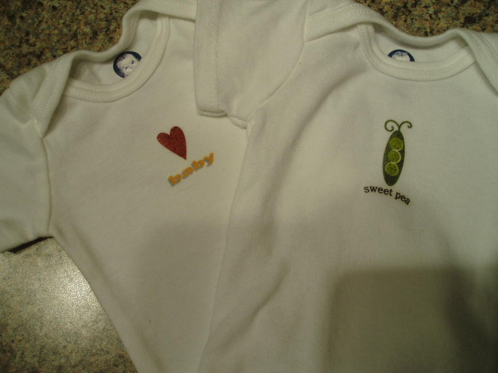 Close up of Sweet Pea onesie