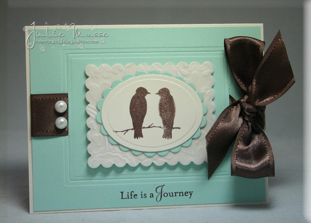 This is an anniversary card I made using a mirror image technique to stamp a bird couple.  I...