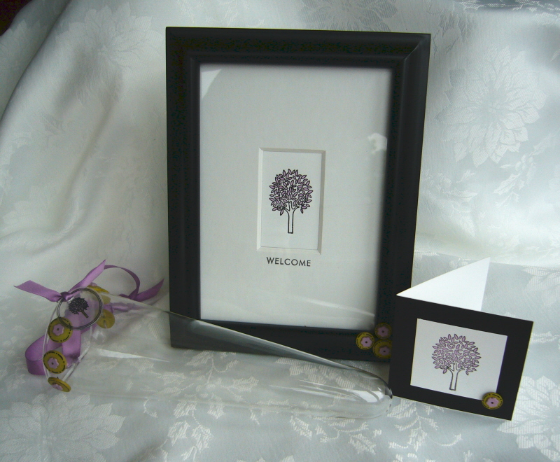 Welcome Gift Ensemble - Frame, card, and glass flower vase that can be hung on the wall.
